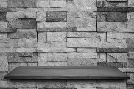 Empty top of wooden table or counter on wall background. For product displayの写真素材