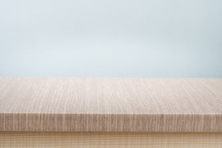 gray wall background  and free space for you and desk spaceの写真素材