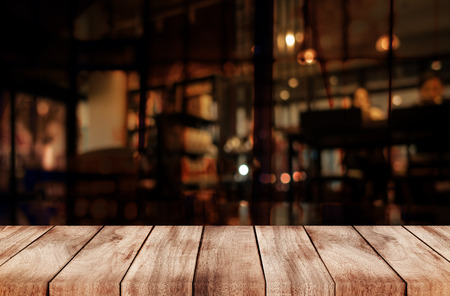 Empty top of wooden table or counter on cafeteria, bar, coffeeshop background. For product displayの写真素材