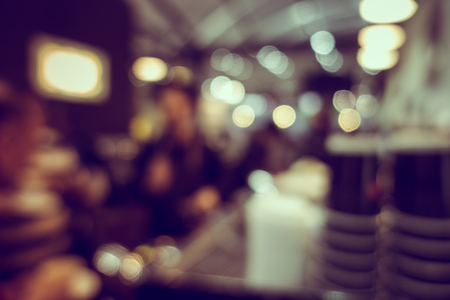 Blur or Defocus image of Coffee Shop or Cafeteria for use as Backgroundの写真素材