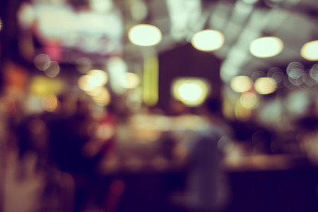 Blur or Defocus image of Coffee Shop or Cafeteria for use as Backgroundの写真素材