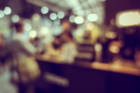 Blur or Defocus image of Coffee Shop or Cafeteria for use as Backgroundの写真素材