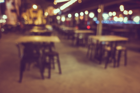 Blur or Defocus image of Coffee Shop, restuarant or Cafeteria at night for use as Backgroundの写真素材