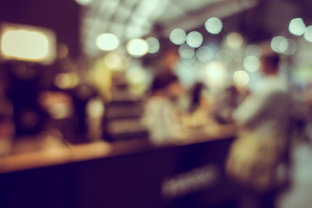 Blur or Defocus image of Coffee Shop or Cafeteria for use as Backgroundの写真素材