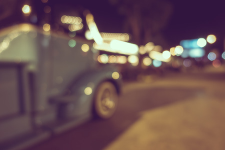 Retro truck at parking lot with bokeh light, vintage effectの写真素材