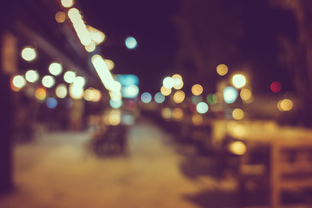 Blur or Defocus image of Coffee Shop, restuarant or Cafeteria at night for use as Backgroundの写真素材