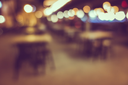 Blur or Defocus image of Coffee Shop, restuarant or Cafeteria at night for use as Backgroundの写真素材