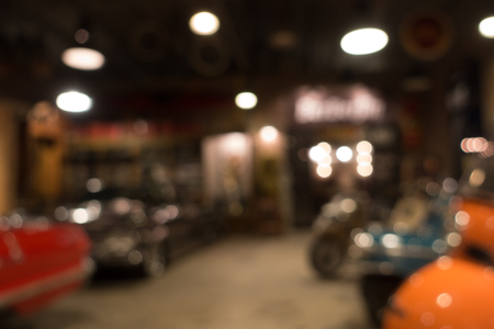 defocus or blur image of retro car and motorcycle, effect by vintage styleの写真素材