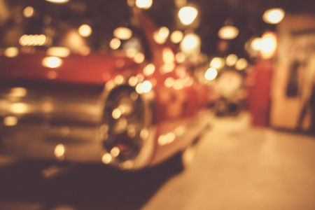 defocus or blur image of retro car and motorcycle, effect by vintage styleの写真素材