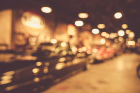 defocus or blur image of retro car and motorcycle, effect by vintage styleの写真素材