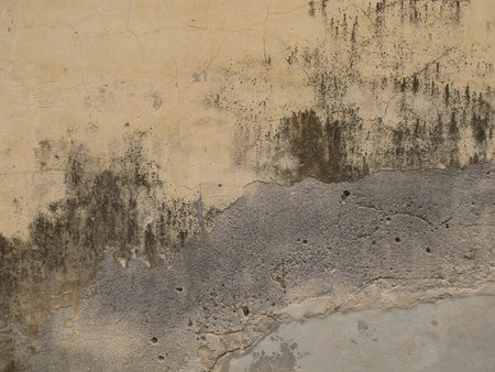 old brick wall in color and dust , Thailand.