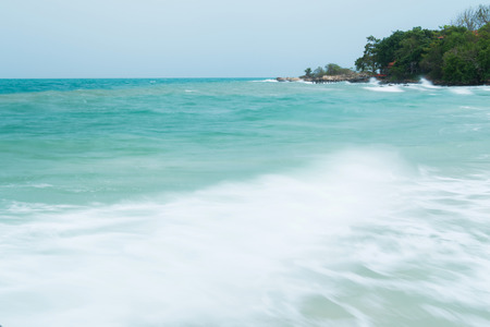 Seashore in morning in cloudy dayの写真素材