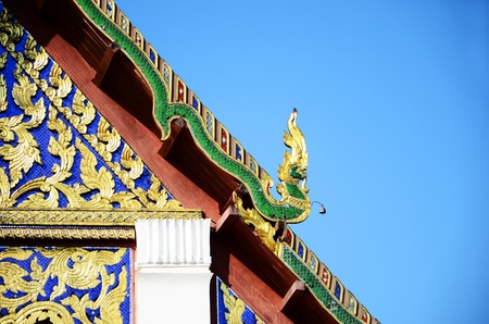 Thai-lanna temple roof with thai dragonの写真素材