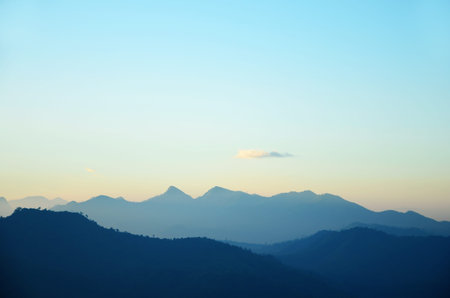 Mountains shadow in morning light Thailand の写真素材