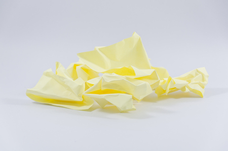 Paper was thrown on the white floor.の写真素材