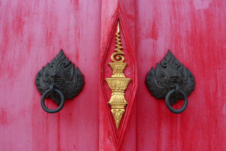 art at red door in the temple of Thailandの写真素材