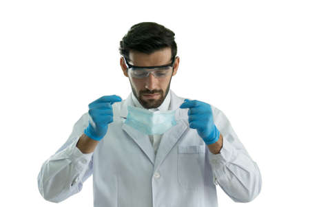 Doctor portrait wearing medical mask and protective glasses Isolated on white background.の写真素材
