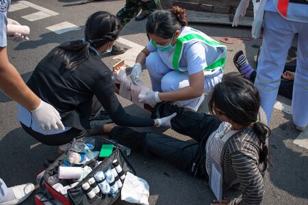 PHANA, AMNAT CHAROEN, THAILAND. - on April 3 , 2018 - The incident occurred during the Songkran festival. In the event, Nursing staff are basic first aid.のeditorial素材
