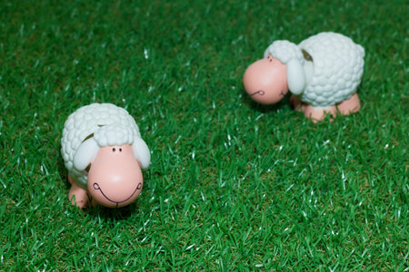 sheep toy on artificial grass