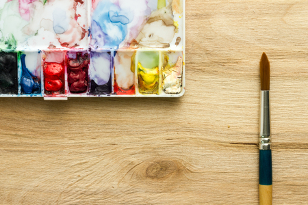 painting equipment on wooden backgroundの写真素材