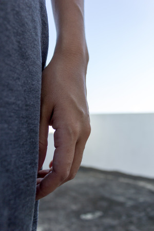 girl hand with gray dressの写真素材