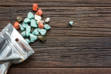 Chocolate candy on wooden tableの写真素材