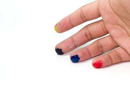 a hand dirty with color on white background