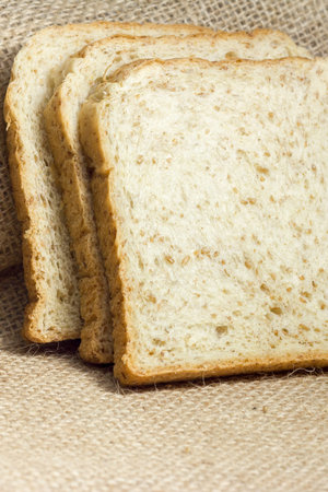 whole wheat bread  on the sack background