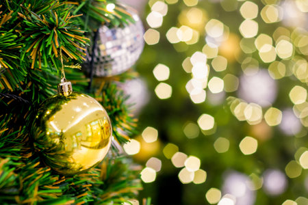 decoration on the tree with bokeh light backgroundの写真素材