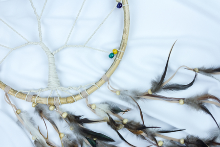 dream catcher isolate on white cloth background with creaseの写真素材