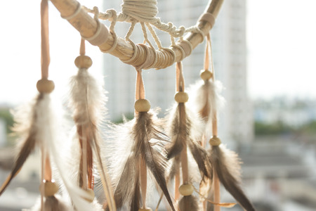 dream catcher on blur background with bright sunlightの写真素材