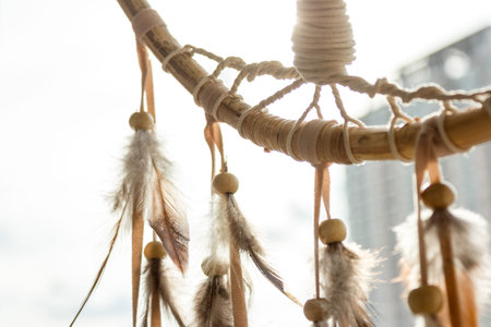 dream catcher on blur background with bright sunlightの写真素材