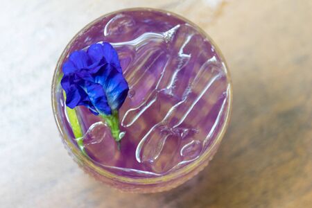 pea and lemon juice with flower on wooden table, Thai style juice dring at summer seasonの写真素材
