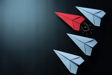 Red paper plane leader concept	の写真素材
