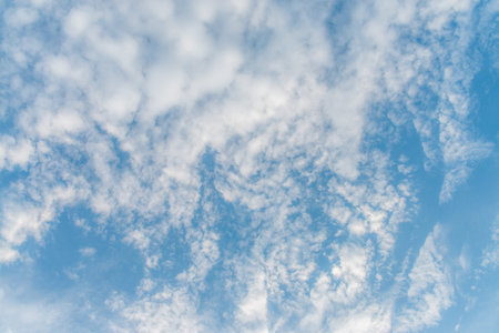 Summer sky and beautiful sun in the blue sky with clouds.