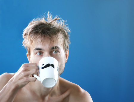 black hair, mustache, good morning, blue backgroundの写真素材
