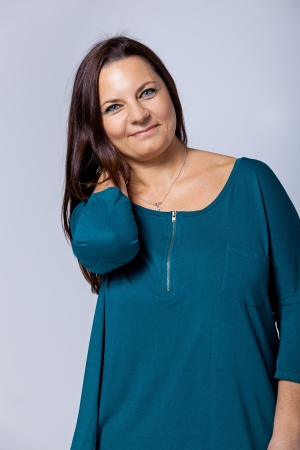 Happy Mature Woman Over a Grey Backgroundの写真素材