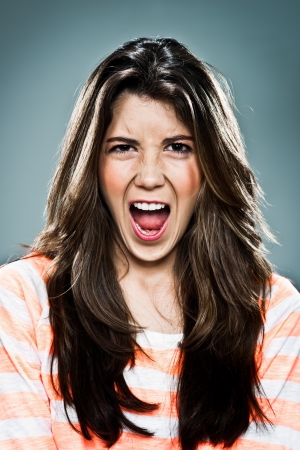 Young Woman Shouting Over の写真素材