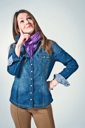 Happy Young Girl Over a Grey Backgroundの写真素材