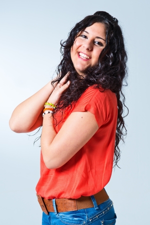 Young Woman on a Light Grey Backgroundの写真素材