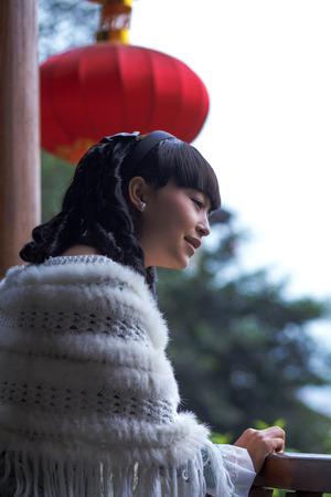 Asian woman in traditional dressの写真素材