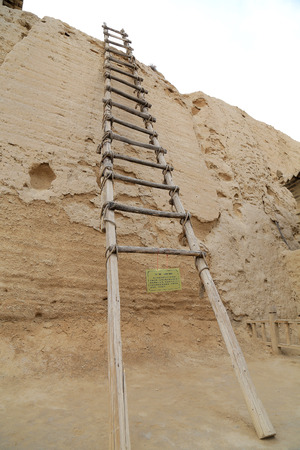 Wooden ladder on the wall, Zhenbeibu China West Film Studioのeditorial素材