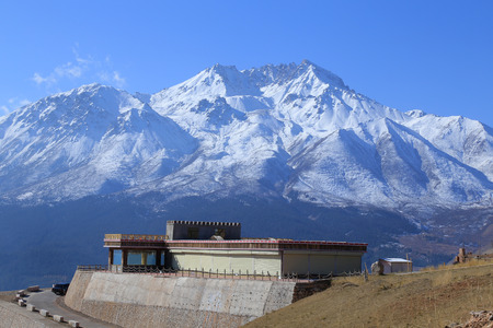 Tibetan house and the snow mountainのeditorial素材