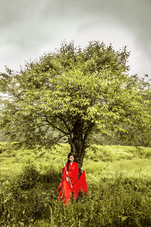 Ancient Chinese lady in redの写真素材