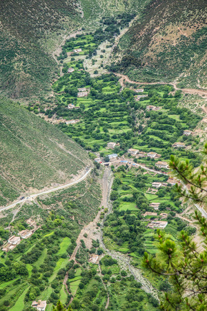 Houses between the mountain valleyの写真素材