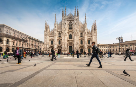 Milan, Italy - April 11, 2013 : Tourists visiting the Piazza Duomo square in Milan, Italyのeditorial素材