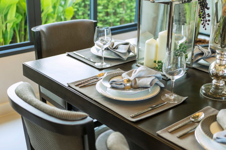table set on wood dinning table at home