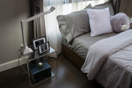 modern luxury bedroom with pillows and lamp