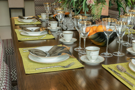 elegant table set in modern style dining room interiorの写真素材