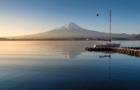 Mount Fuji in the early morning with reflection on the lake kawaguchikoの写真素材